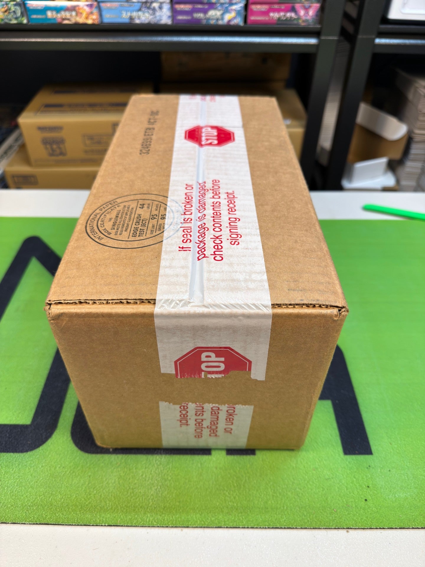 Pokémon Prismatic Evolutions Pokémon Center ETB Case (4 PC ETBs)