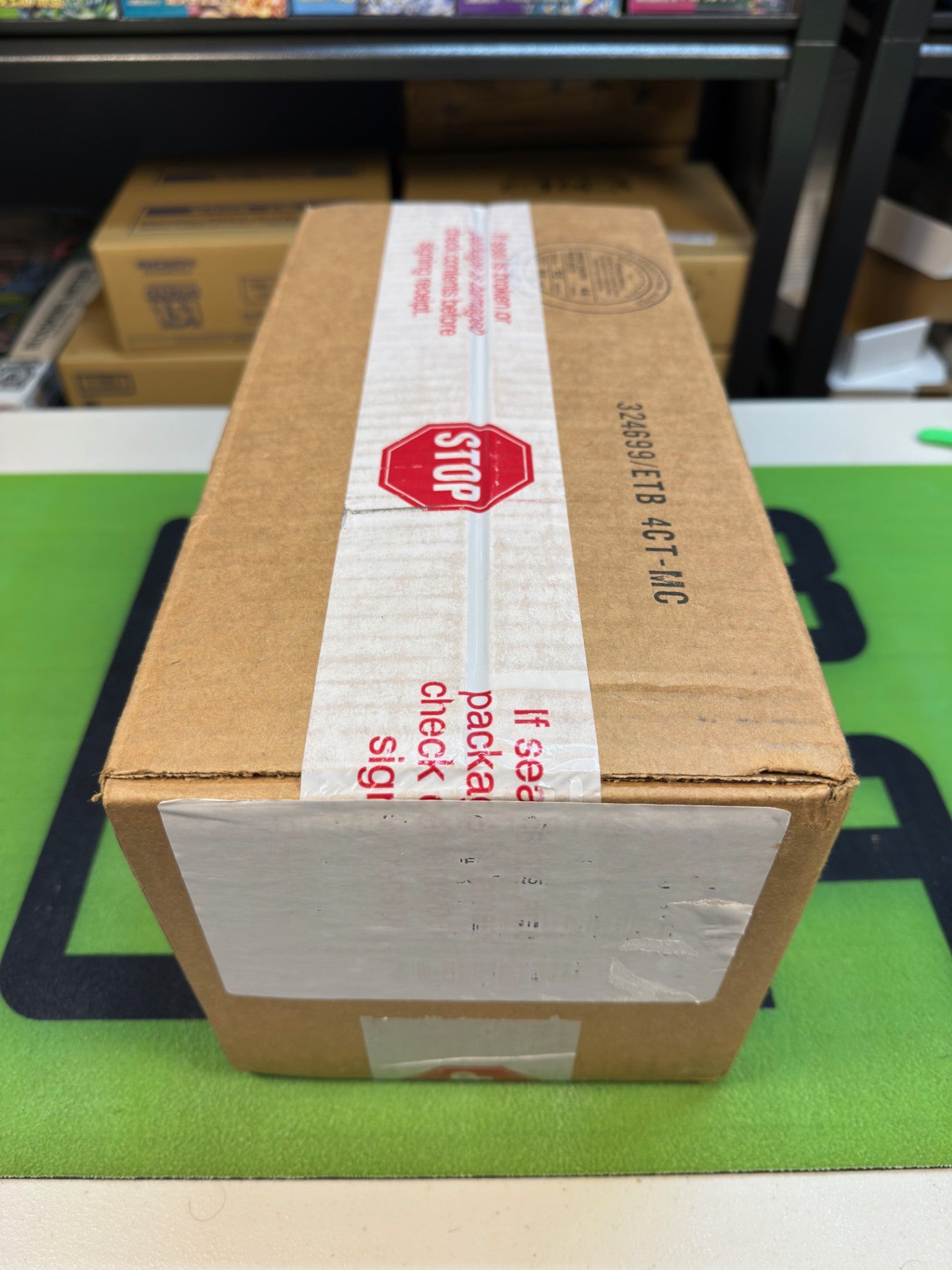 Pokémon Prismatic Evolutions Pokémon Center ETB Case (4 PC ETBs)